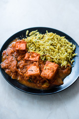 Indian Food Paneer Butter Tikka Masala / Cheese Cottage Curry and Jeera Zira Rice Basmati Pilaf or Pilav.