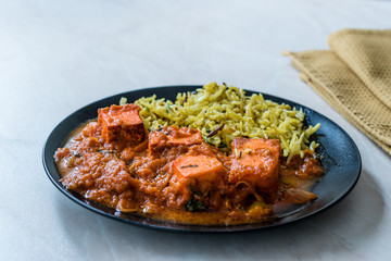 Indian Food Paneer Butter Tikka Masala / Cheese Cottage Curry and Jeera Zira Rice Basmati Pilaf or Pilav.