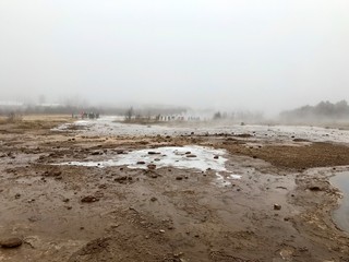 The Blesi Northern Pool, part of Haukadalur, the home of geysers and other geothermal features along the Golden Circle tourist route in southern Iceland on a foggy autumn afternoon