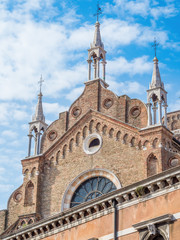 Fototapeta na wymiar Venice, Italy, Basilica (church) of Santa Maria Gloriosa dei Frari, a church located in the Campo dei Frari at the heart of the San Polo district of Venice