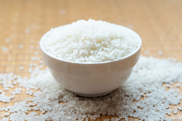 Fototapeta na wymiar Beautiful japanese rice on japanese mat,round rice grain
