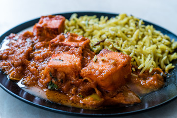 Indian Food Paneer Butter Tikka Masala / Cheese Cottage Curry and Jeera Zira Rice Basmati Pilaf or Pilav.