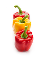 Three fresh sweet pepper isolated on white background