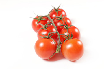 red cherry tomato isolated on white background