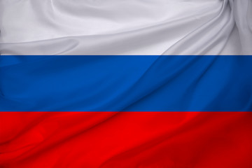photo of the beautiful colored national flag of the modern state of Russia on textured fabric,...