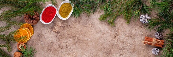Spicy Christmas background. ingredients for cooking baking. Flat lay with copy space. Banner.