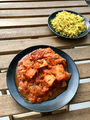 Indian Food Paneer Butter Tikka Masala / Cheese Cottage Curry and Jeera Zira Rice Basmati Pilaf or Pilav.