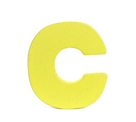 Yellow wooden alphabet letter c isolated on white background