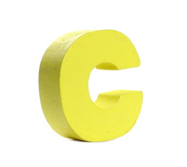 Yellow wooden alphabet letter c isolated on white background
