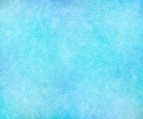 Blue frosty winter background with scratched effect.