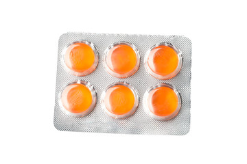 Medical candies in blister pack isolated on white background