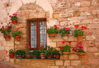 Fototapeta na wymiar Old window in Assisi