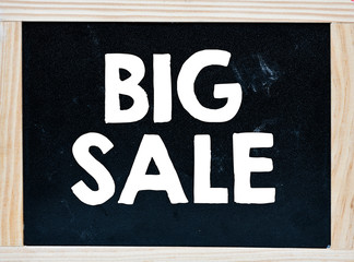 Big sale text on the whiteboard. Business concept - sale in stores.