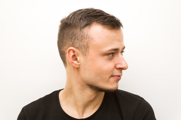 Obraz premium emotion look, young man on a white background, human emoji