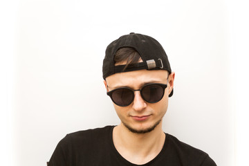 emotion expressionless, young man in black cap and black glasses on a white background, people emoji