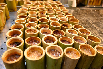 Rice roasted in bamboo..