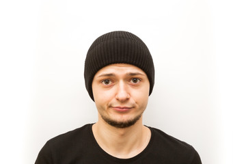 emotion worried, young man in a black cap on a white background, man emoji
