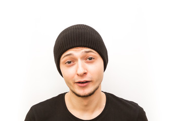 emotion angry, young man in a black cap on a white background, man emoji