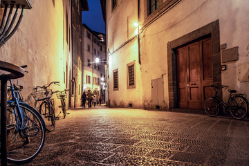 Narrow street in Florence at night