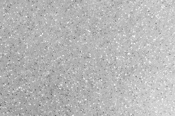 Gray wall with black spots and scratches background texture. abstract surface