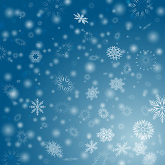 Blue Winter background with flay white blurred snowflakes