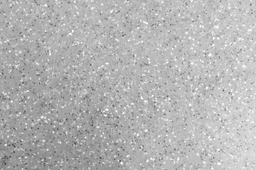 Gray wall with black spots and scratches background texture. abstract surface