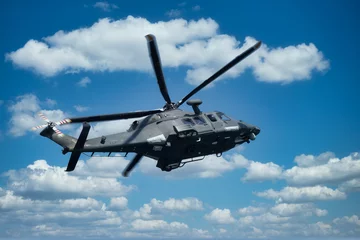 Gordijnen Militaire helikopter op lage hoogte © nicolagiordano