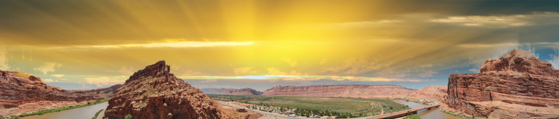 Fototapeta na wymiar Colorado River near Moab, Utah. Arches National Park gateway, aerial view from drone at sunset