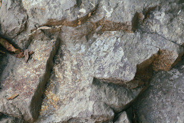 Concrete wall texture background. Natural stones. Building's facade decor. Decorative plaster. House exterior.	
