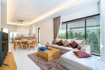 spacious open plan living room and dining area