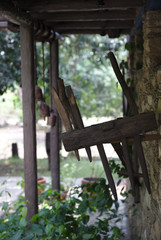 NB__7688 Wooden agricultural tools hanging on wall