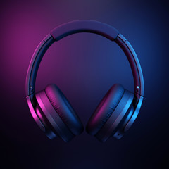 Fototapeta na wymiar Headphones on dark black background. 3d render