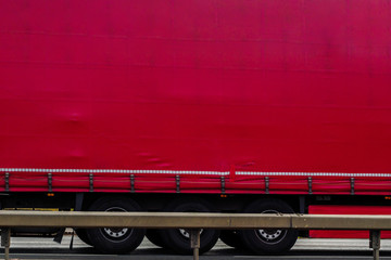 red lorry truck trailer background on uk motorway