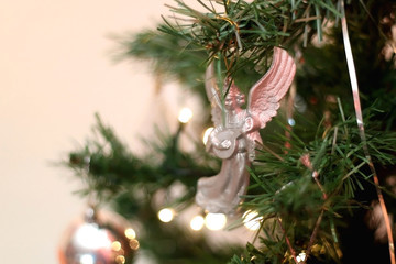 Fototapeta premium Traditional decorations on a Christmas tree. Selective focus.