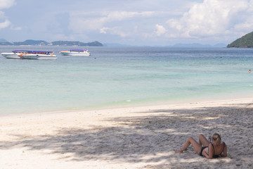 Fototapeta na wymiar tourist on sunny day beach at Phuket island , Thailand