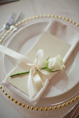 Beautiful table setting with white flowers