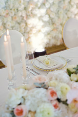 Beautiful table setting with white flowers