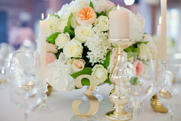 beautiful flowers compositions and candles