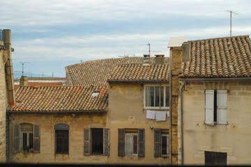 Avignon. Provence. France. October 09.2019.  Editorial. View from the window on the old town in Avignon. Tiled roofs and windows of houses. Provence tourism.