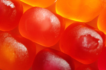 Blurred image of jelly candies. Abstract colorful food background. 