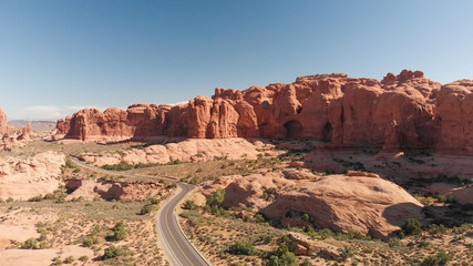Aerial panoramic view of Arches National Park landscape, Utah. Drone point of view at sunset