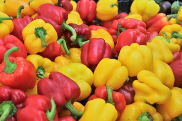 closeup of  peppers on display at the market