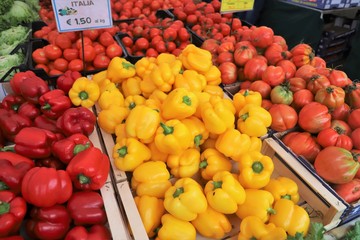 closeup of  peppers on display at the market