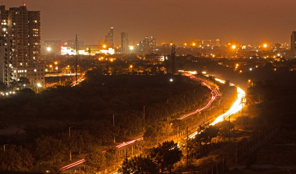 view of a busy road  at night time