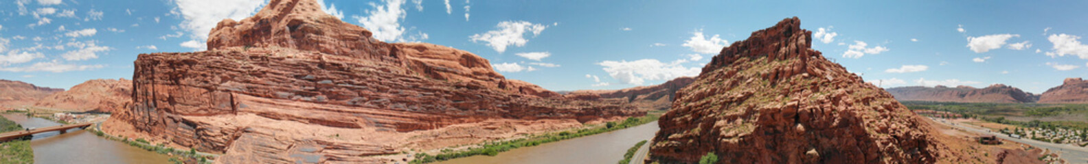 Fototapeta premium Colorado River near Moab, Utah. Arches National Park gateway, aerial view from drone at sunset