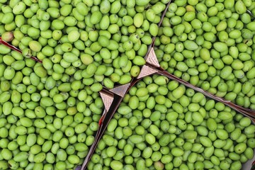 closeup of olives exposed to the market