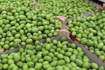 closeup of olives exposed to the market