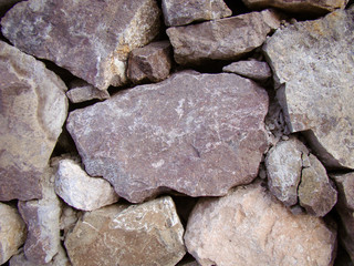 A wall of large stones with sharp edges for the background.