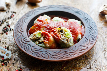 cabbage rolls with mushrooms and tomato sauce