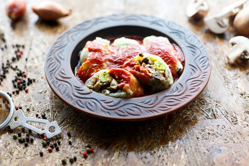 cabbage rolls with mushrooms and tomato sauce